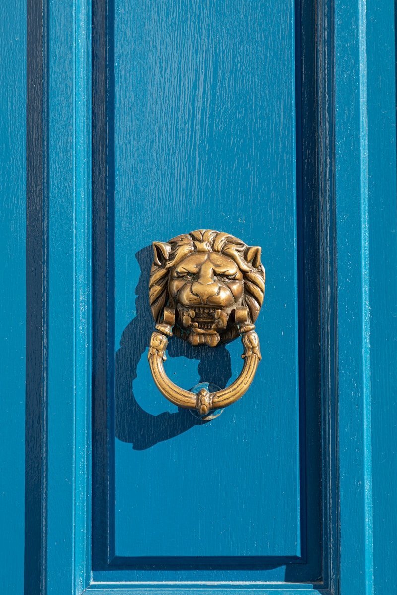 gold lion door knocker