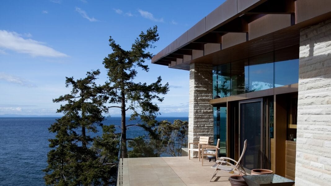 a balcony with a view of the ocean